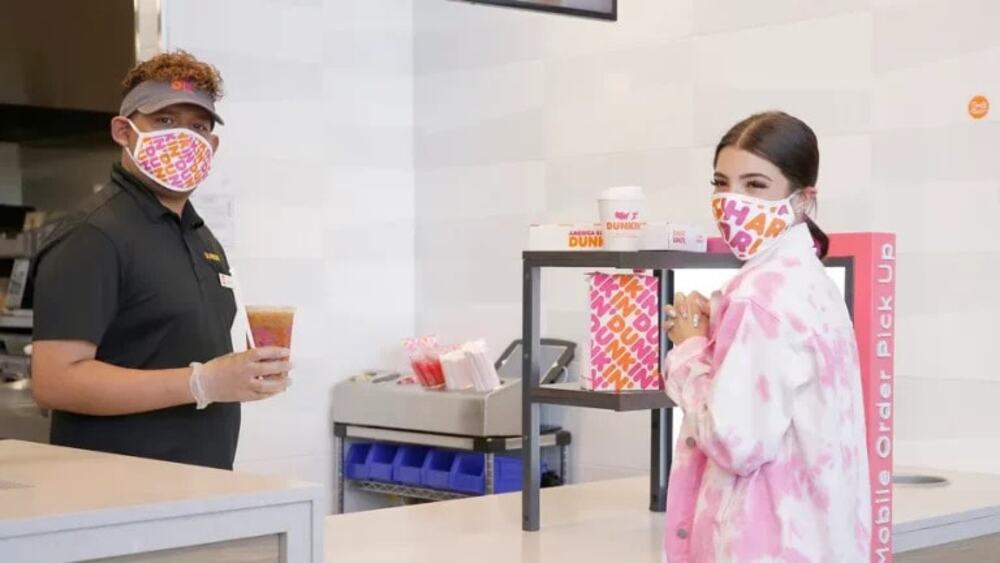 Charli D'Amelio ordering her signature drink from Dunkin' Donuts